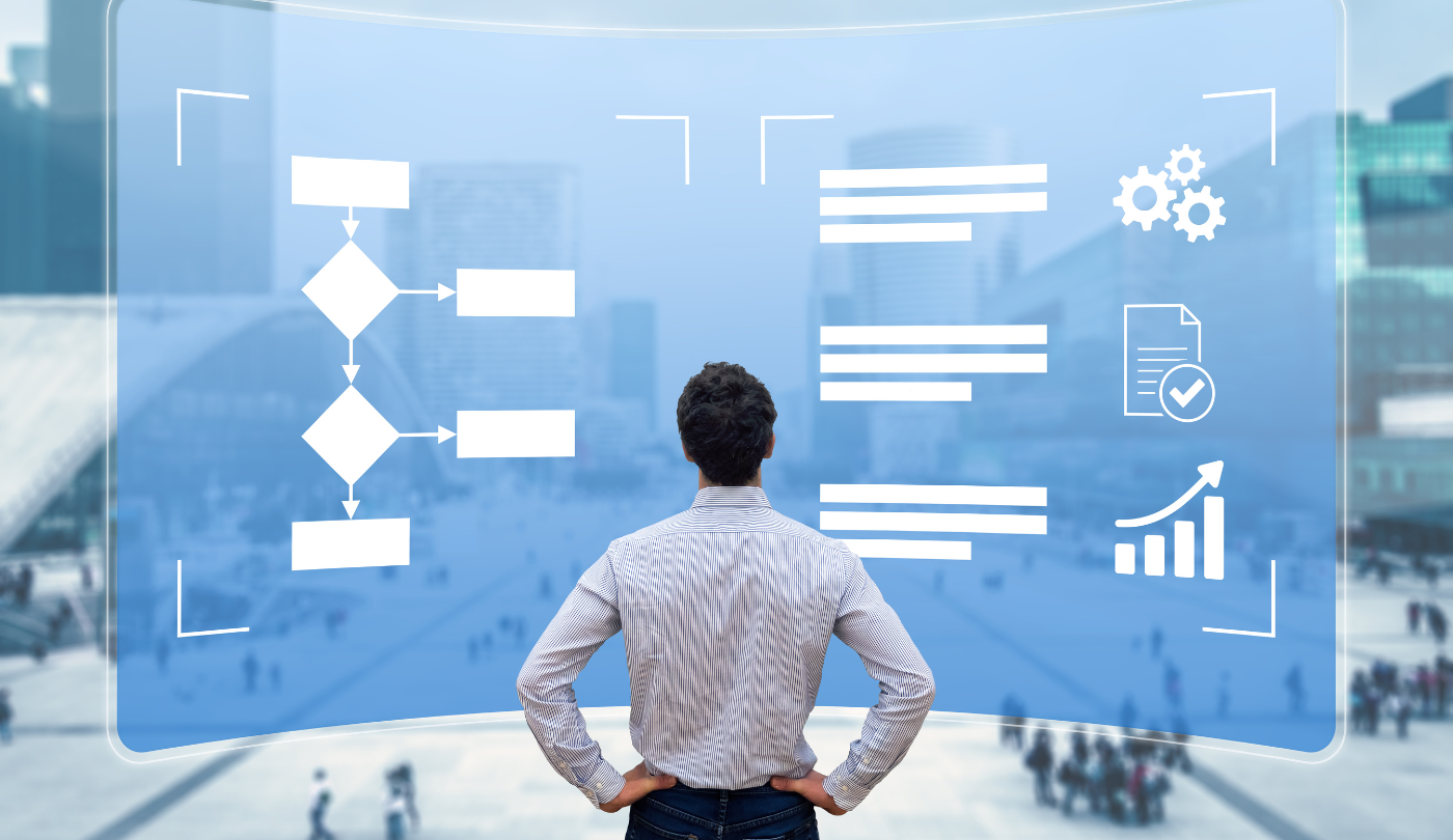 Man looking at digital process diagrams and data visualizations projected in the air
