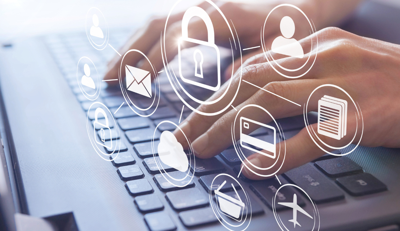 Hands typing on a keyboard with digital security symbols